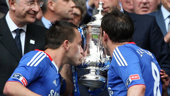John Terry and Frank Lampard celebrate with the FA Cup after completing a domestic double.