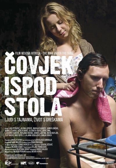 Covjek ispod stola